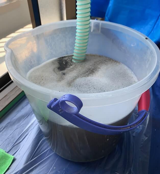 エアコンクリーニング-水元-洗浄後の汚水
